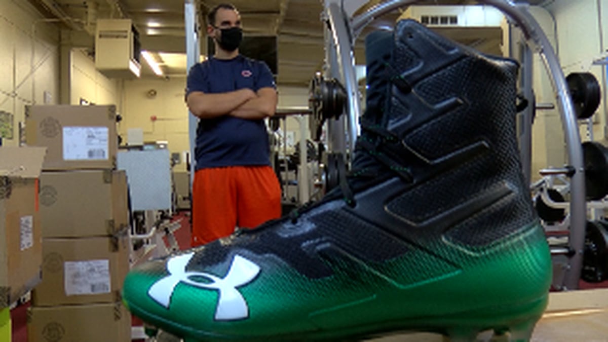 Huntsville City Schools football coaches receive football cleats, gloves from The Boys and...