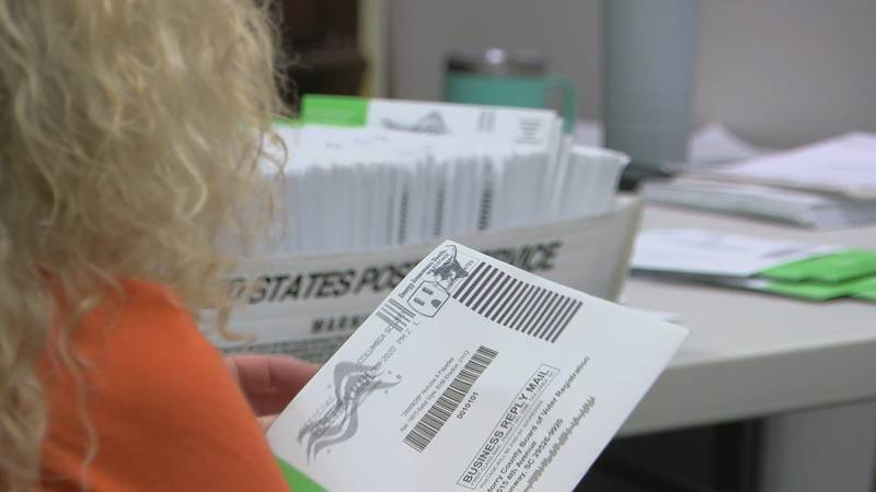 Sunday was the first time election officials were allowed to open mail in absentee ballots...