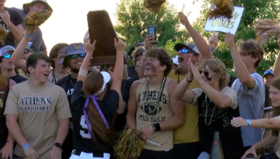 Athens Senior First baseman Brynn South celebrates with the Athens student body after winning...