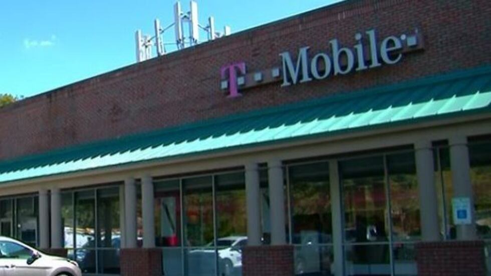 Officers said the burglars tore a hole through the wall to get to T-Mobile. Once in, they used...