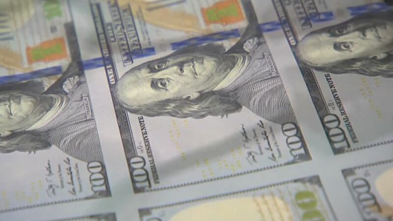 Photo of $100 bills.