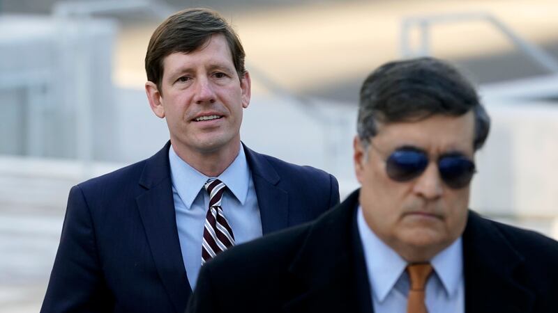 FILE - Former Republican state Sen. Brian Kelsey, left, arrives at federal court, Nov. 22,...