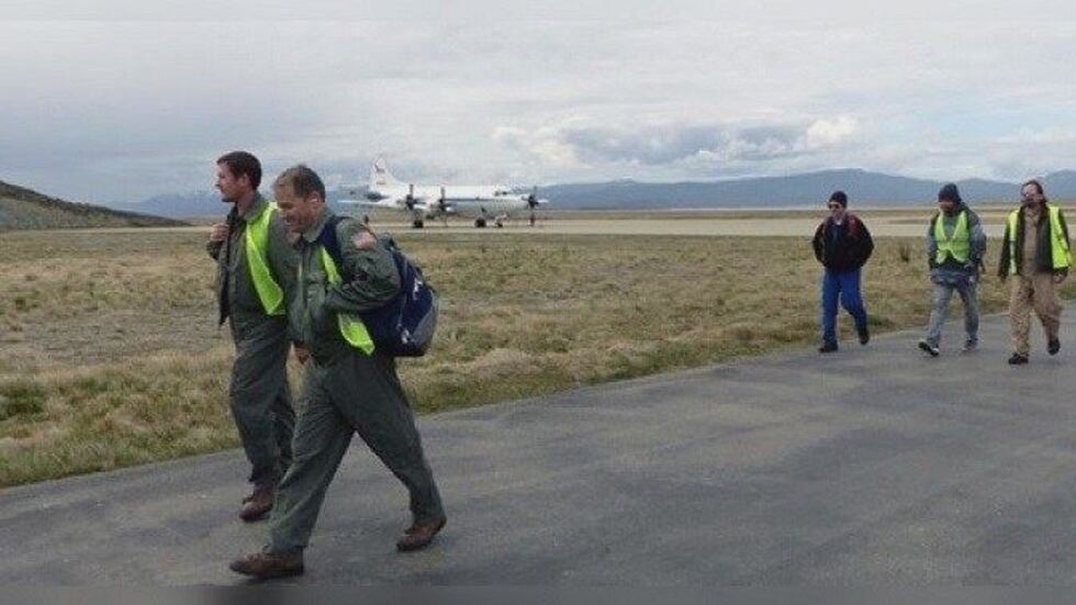 Jay Stapleton (Pilot), Trey Carter (Pilot), Pat Didier (NOAA Pilot in blue flight suit), and...