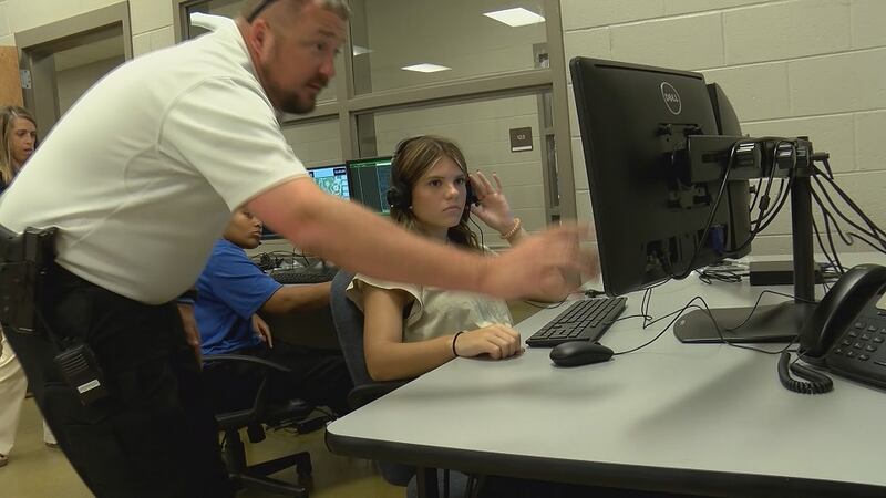 Instructor Danny Pepper shows a student how to operate the new 911 simulator at Limestone...