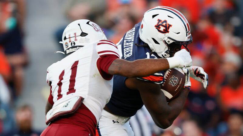 Auburn tight end Rivaldo Fairweather (13) catches a pass over New Mexico State safety Dylan...