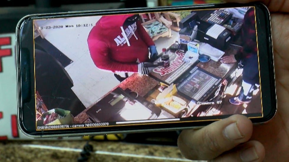 Surveillance camera at the Fuel City convivence store captured the armed robbery that ended...