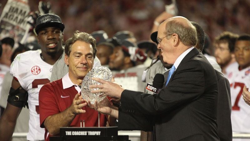 Nick Saban receives the Coaches' Trophy for the third time since becoming UA's head coach....