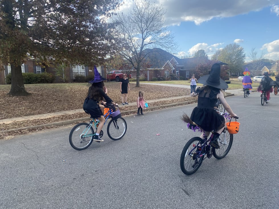 The riders zooming past in the neighborhood in Monrovia