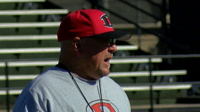 Decatur Red Raiders Head Football Coach Jere Adcock conducts practice