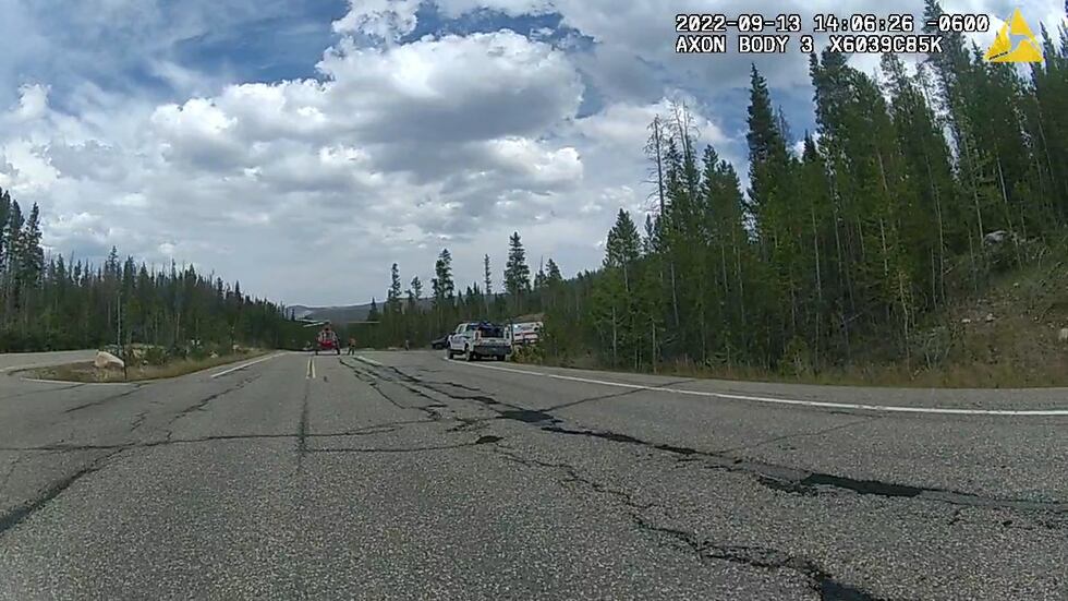 A deputy's body camera shows a helicopter arriving on the scene to transport the injured...