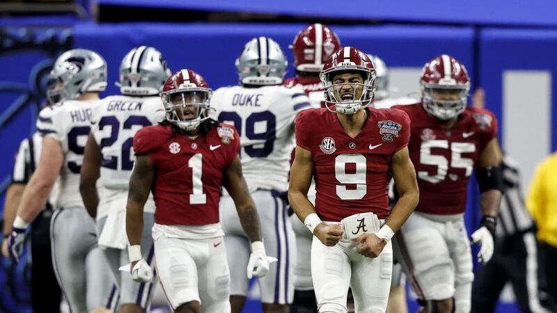 Alabama quarterback Bryce Young (9) reacts after throwing a touchdown pass during the first...